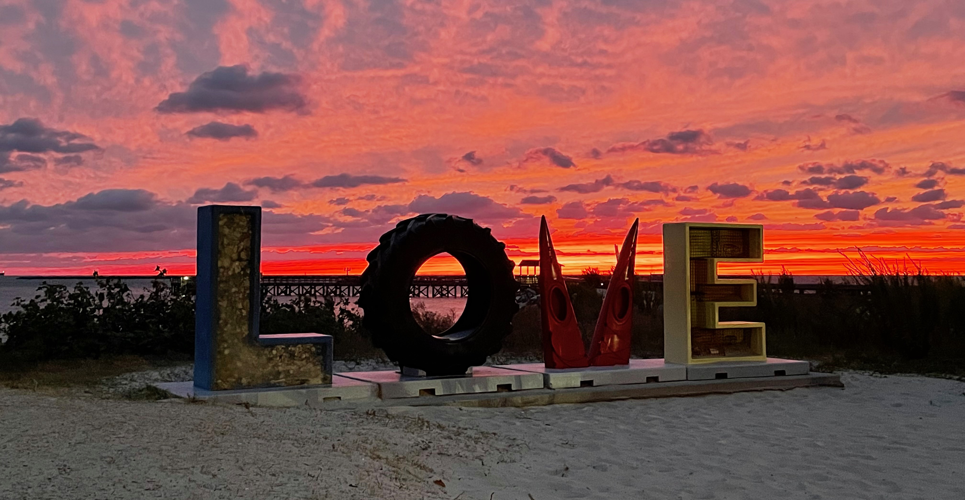 Sunset at the LOVE sign, on the Chesapeake Bay